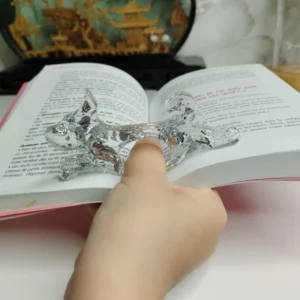 Bague de lecture en forme de chien avec paillettes argentées, parfaite pour les enfants amateurs de lecture.