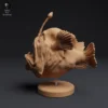 Figurine détaillée d'une baudroie à bosse à taille réelle, capturant fidèlement les caractéristiques physiques de l'animal. Idéale pour les collectionneurs, les amateurs de modèles réduits et les artistes cherchant à créer des dioramas réalistes.