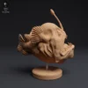 Figurine détaillée d'une baudroie à bosse à taille réelle, capturant fidèlement les caractéristiques physiques de l'animal. Idéale pour les collectionneurs, les amateurs de modèles réduits et les artistes cherchant à créer des dioramas réalistes.