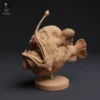 Figurine détaillée d'une baudroie à bosse à taille réelle, capturant fidèlement les caractéristiques physiques de l'animal. Idéale pour les collectionneurs, les amateurs de modèles réduits et les artistes cherchant à créer des dioramas réalistes.