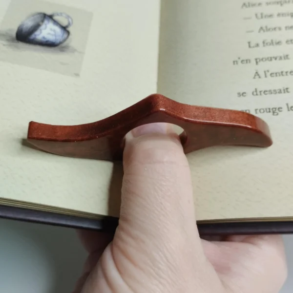 Bague de lecture en forme de vague couleur bronze, parfaite pour les amateurs de lecture.