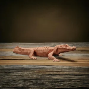Figurine à peindre représentant un crocodile à l'échelle 1/24, parfaite pour les projets artistiques et les dioramas.