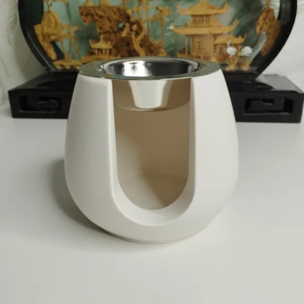 rûleur d'encens en jésmonite blanc moderne, design minimaliste.