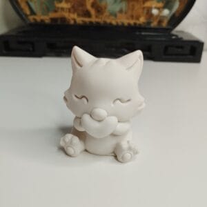 statuette décorative chat blanc contours doux ambiance romantique