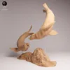 socle-rocher-animaux-marins Les figurines de phoques en résine échelle 1/24 exposées sur leur socle rocheux, idéales comme accessoires pour une maquette bord de mer réaliste.