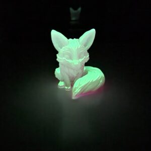 Veilleuse originale renard brillant en vert fluo dans l'obscurité.