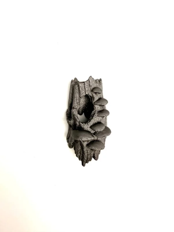 nid-araignee-sauteuse-magnetique Vue arrière du nid araignée sauteuse montrant le système de fixation pour refuge magnétique terrarium.