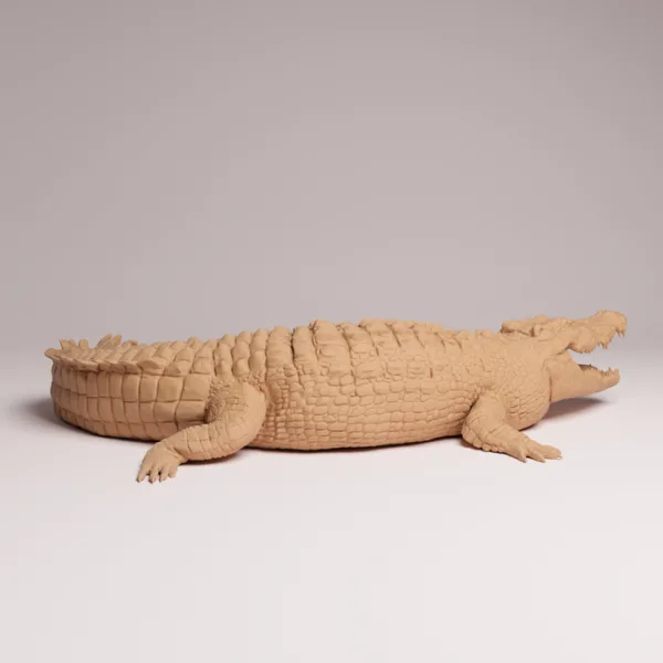figurine-crocodile-marin-brute-resine Figurine crocodile marin brute en résine vue de trois quarts avec la gueule ouverte, échelle 1/32.
