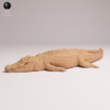 Crocodile marin miniature sur son socle circulaire texturé, prêt pour la peinture de modélisme.