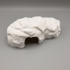 abri-pour-gecko-impression-3d-pla Zoom sur les fines stries d'impression 3D de l'abri pour gecko en PLA blanc, prêtes à être peintes.