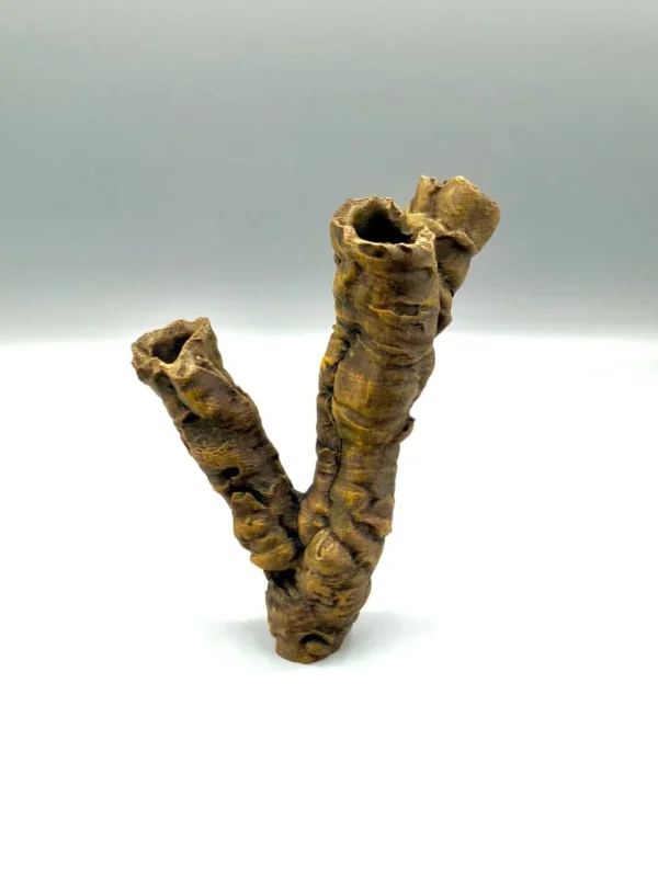 Rendu du kit brut en PLA du refuge pour reptile, présentant les multiples entrées caverneuses de l'objet.