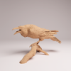 atelier-peinture-figurine-oiseau Préparation d'une figurine de corvidé sur un plan de travail de modéliste avec pinceaux.