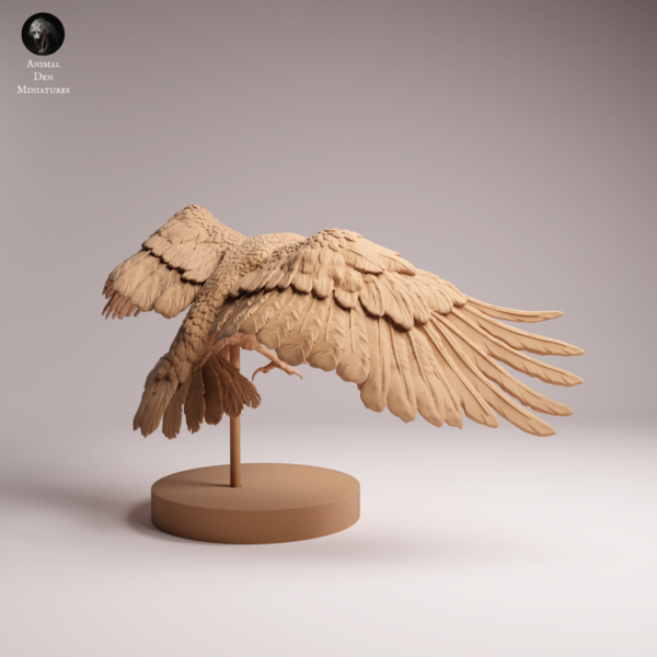 Oiseau miniature de corbeau non peint fixé sur un socle circulaire pour la peinture de collection.