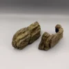 decor-drome-artificiel-strates-geologiques Vue rapprochée des strates géologiques et des micro-stries de précision d'un dôme artificiel pour reptile.