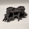 Détail des réceptacles pour plantes et de l'écorce de cette grotte avec jardinière en impression 3D.