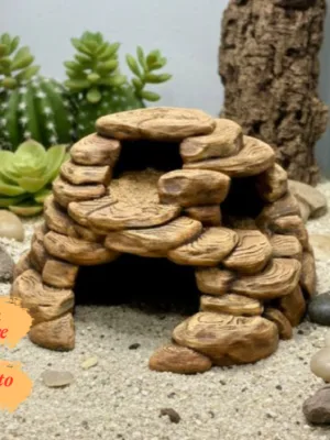 cachette-grotte-terrarium-desertique-peinte Cachette grotte terrarium désertique à peindre, parfaitement intégrée comme abri pour reptile dans un biotope aride.