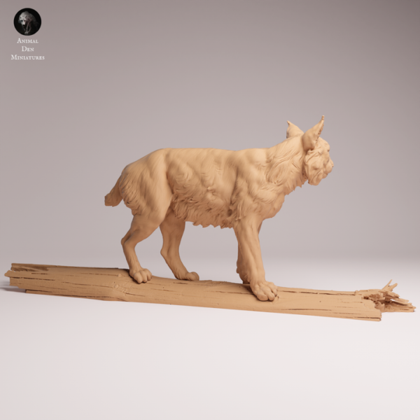 Gros plan sur le visage et le pelage épais de la miniature de lynx boréal pour diorama, montrant la texture réaliste de sa fourrure et ses oreilles en pointe.